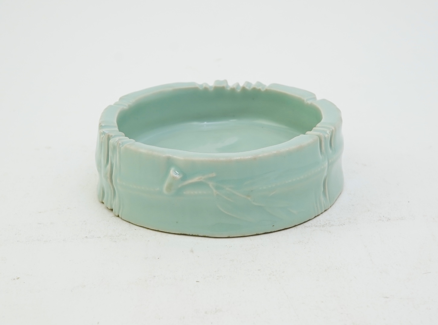A Chinese celadon glazed brushwasher, Qianlong mark but later